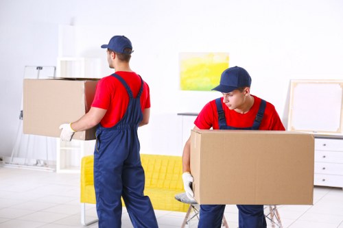 Man and van loading furniture for a local move in Haringey