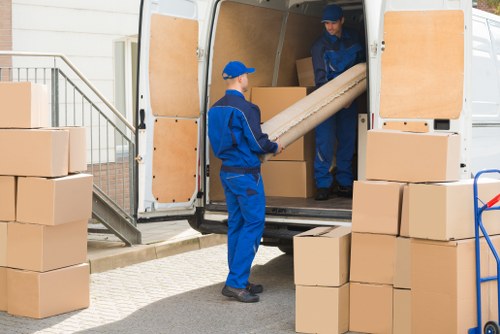 Removal team preparing equipment before a safe move