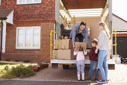 Professional movers handling office furniture during a Haringey relocation