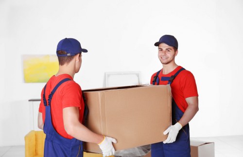 Boxes and furniture prepared for transport with a removal van in Haringey