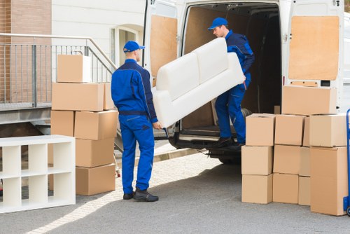 Furniture removals team helping with a home move in Haringey