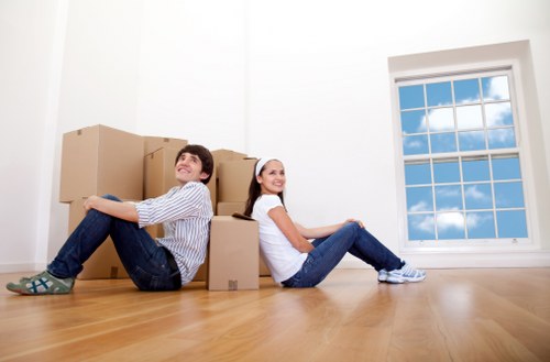 Packed furniture and boxes ready for a local flat relocation in Haringey