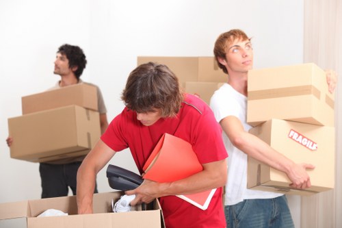 Packed boxes and furniture ready for transport in North London
