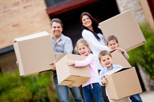 Careful packing and loading of office equipment for a local move