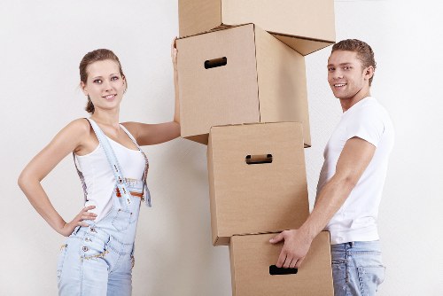 Packed boxes and dismantled furniture ready for transport in Haringey